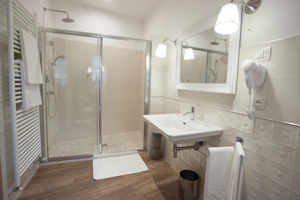 אסיסי Magnifica Luxury Suites מראה חיצוני תמונה